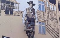Gary Cooper jako szeryf Will Kane na muralu w Rzeszowie