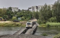 Doradca prezydenta Ukrainy: 450 grobów na miejscu zbiorowego pochówku w Iziumie