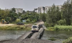 Doradca prezydenta Ukrainy: 450 grobów na miejscu zbiorowego pochówku w Iziumie