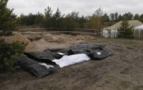 Ukraińska policja: 146 ciał ekshumowano ze zbiorowego grobu w Łymanie